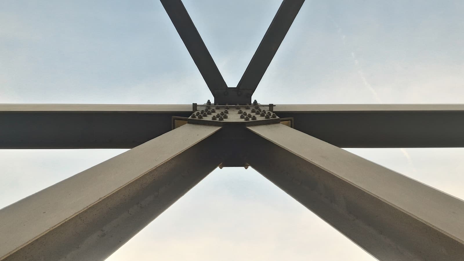 Low-angle view of structural steel post